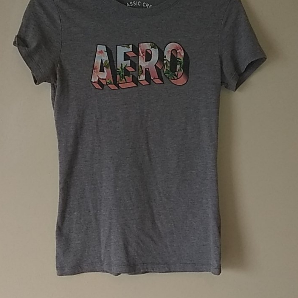 Women's medium Light grey AERO shirt.
